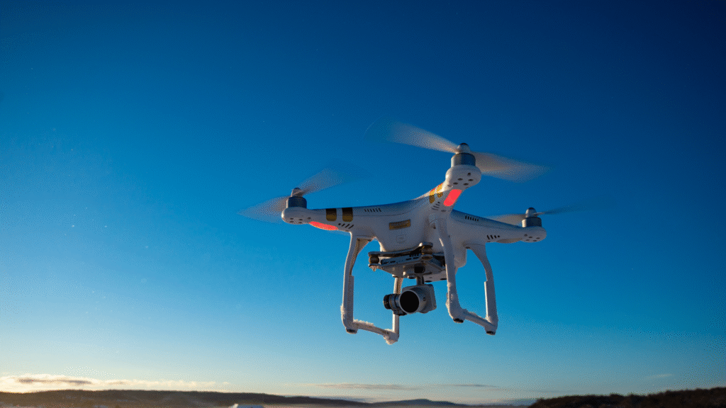 Drone flying in the open horizon