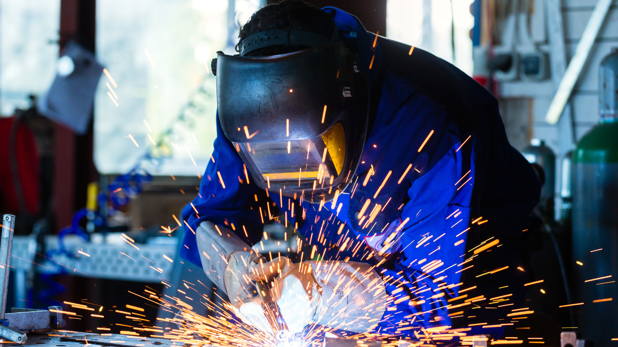 A Worker in a Mask performing welding work