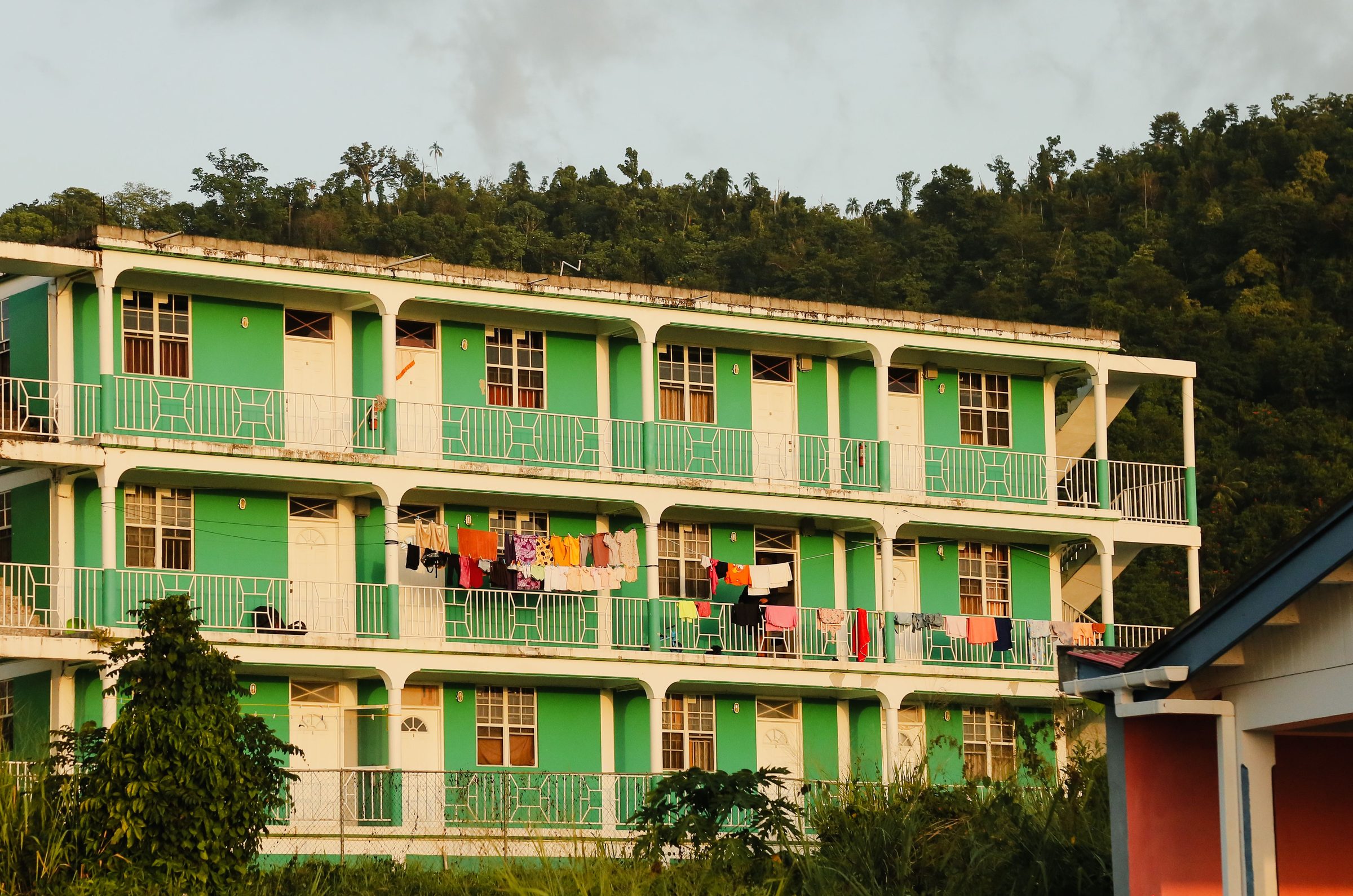A three-storey accommodation block with laundry on the balconies