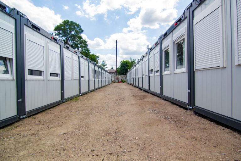 Row of modular worker accommodation cabins