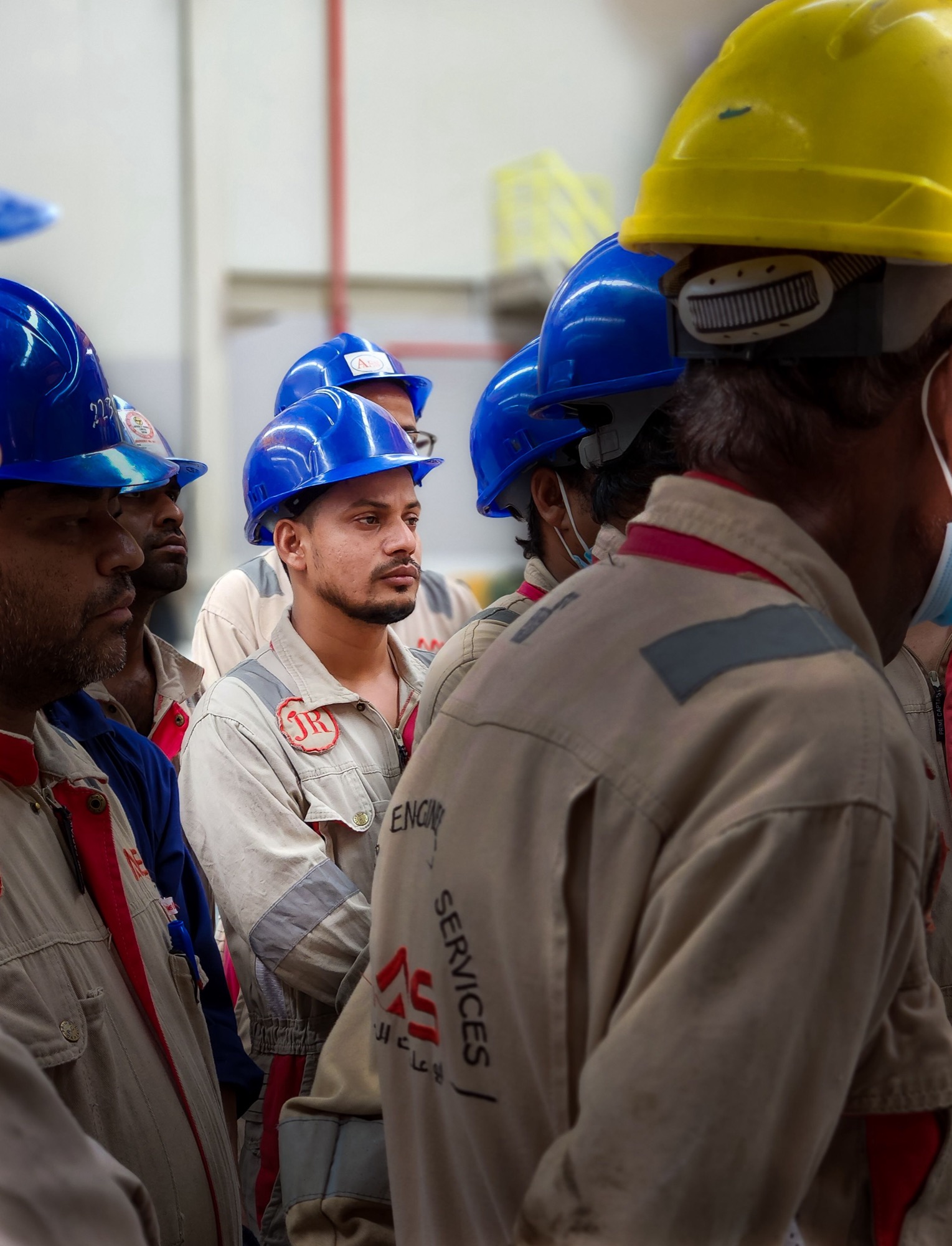 Workers in discussion on site