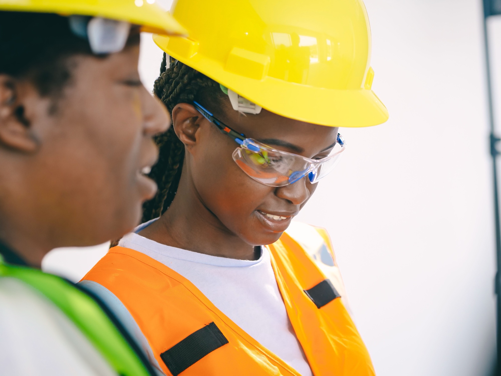 Two workers in hi-vis